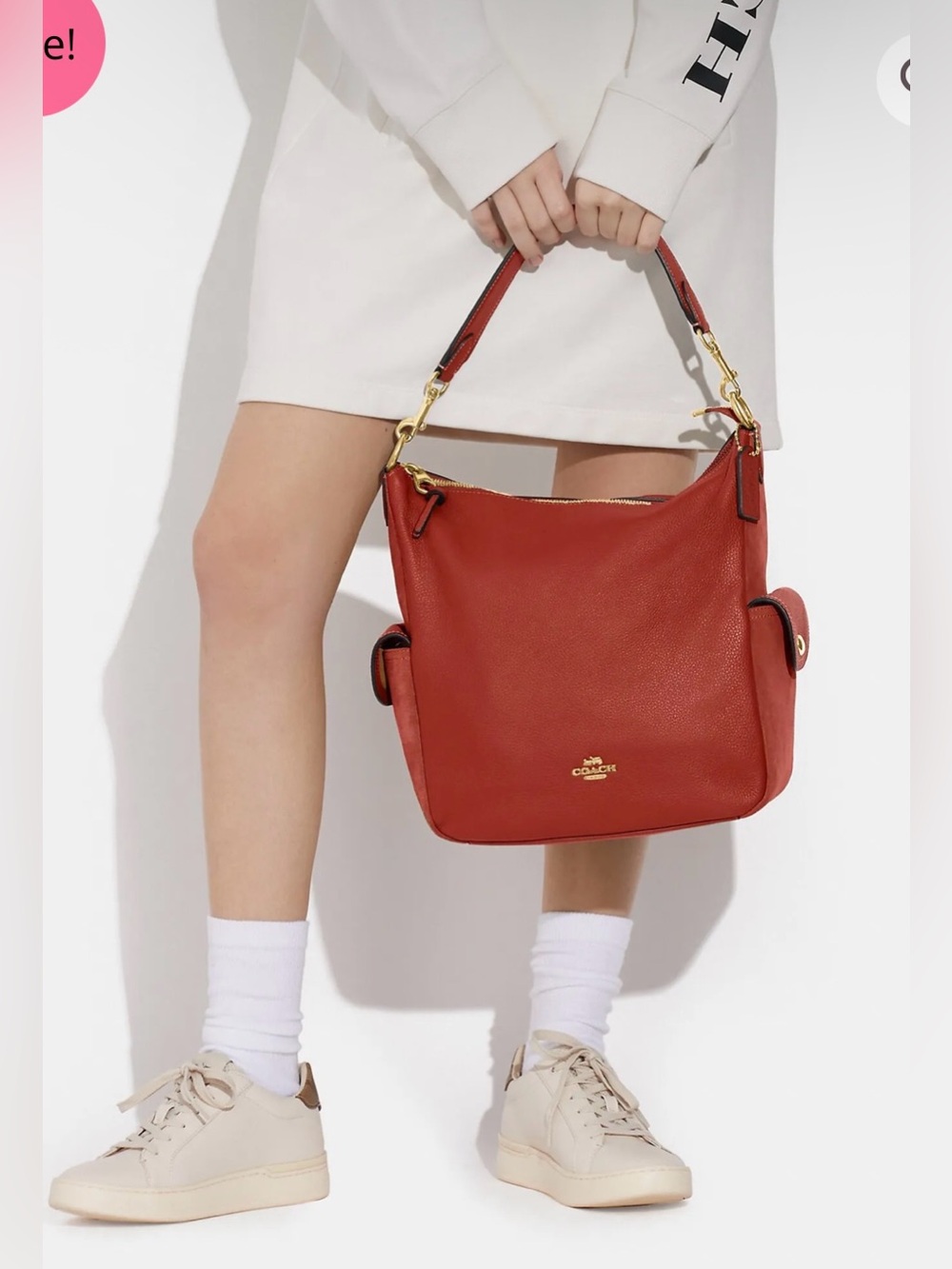 Coach Pennie Shoulder Bag features gold hardware and side suede pockets - Picture 2 of 15